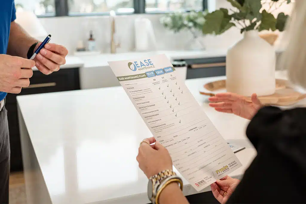 Customers scheming through Frymire's EASE brochure